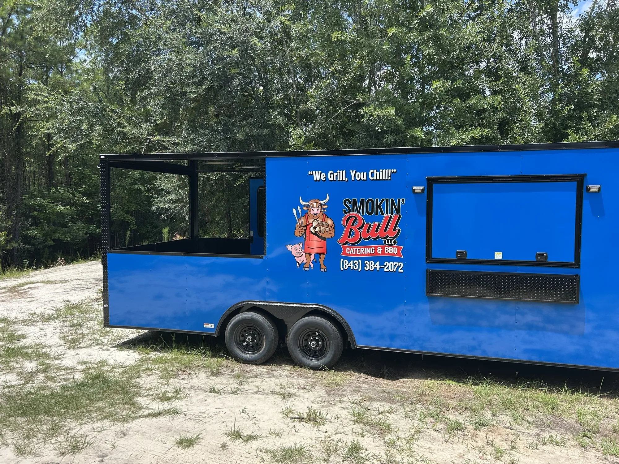 Smokin' Bull food truck serving window open