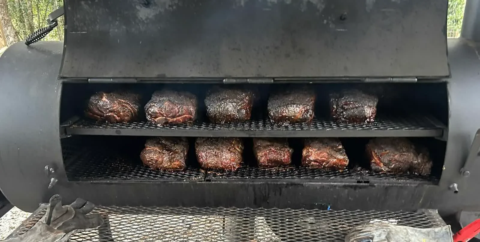 Pork butts smoking on the Lang smoker