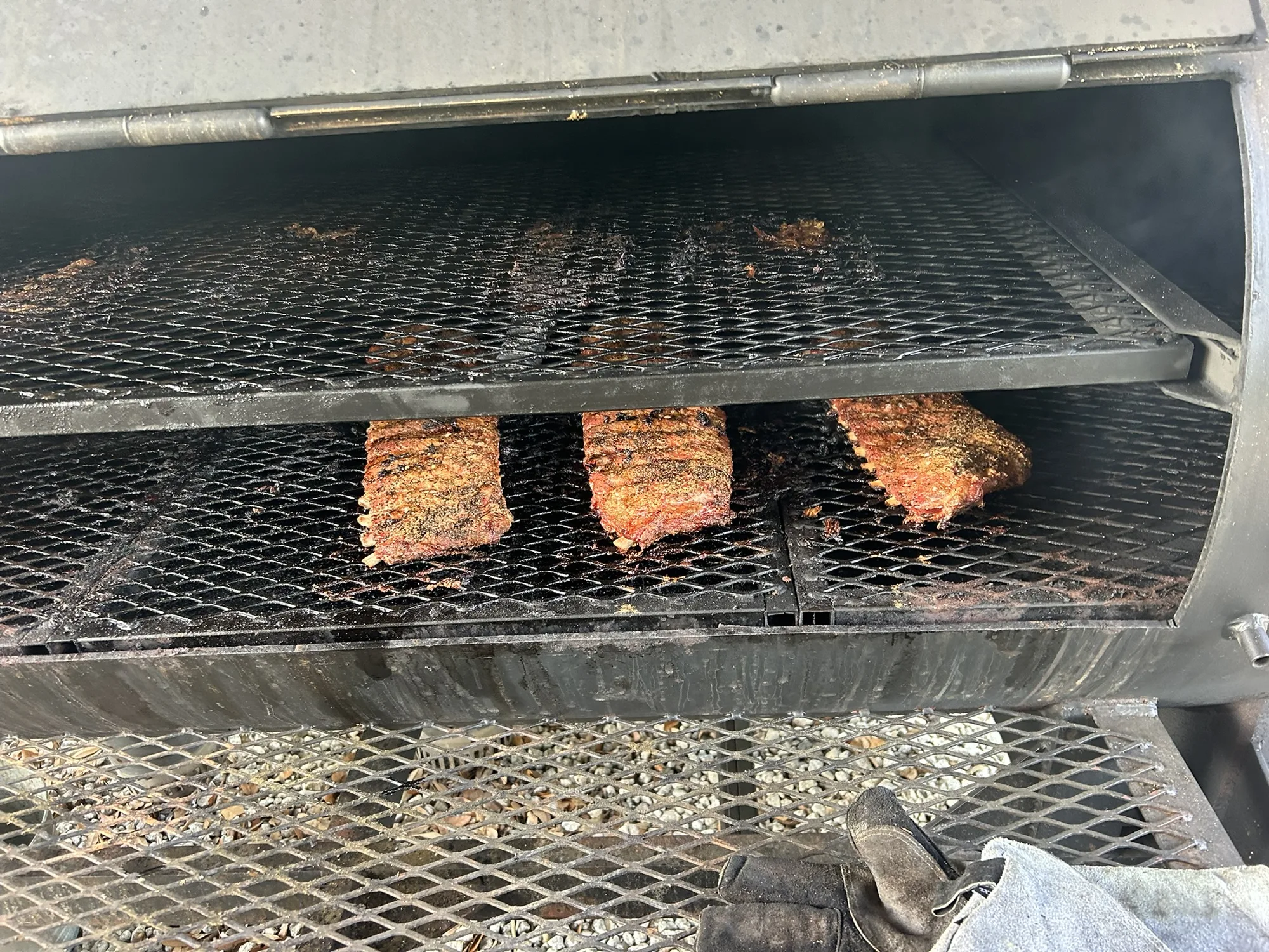 Ribs on the smoker grate